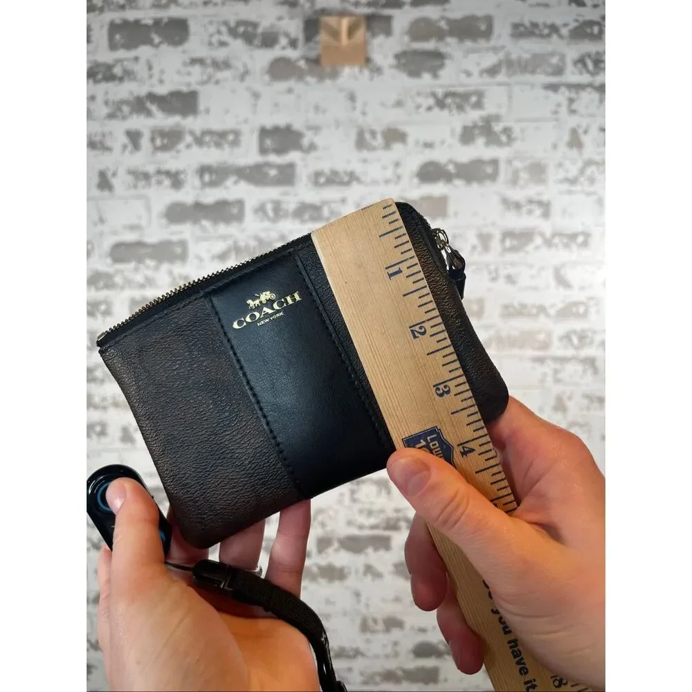 Coach | leather wristlet with strap